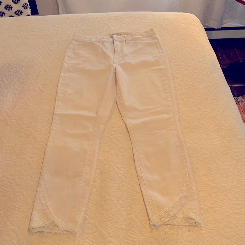 Jen 7 white skinny jeans with lace detail in ankles.